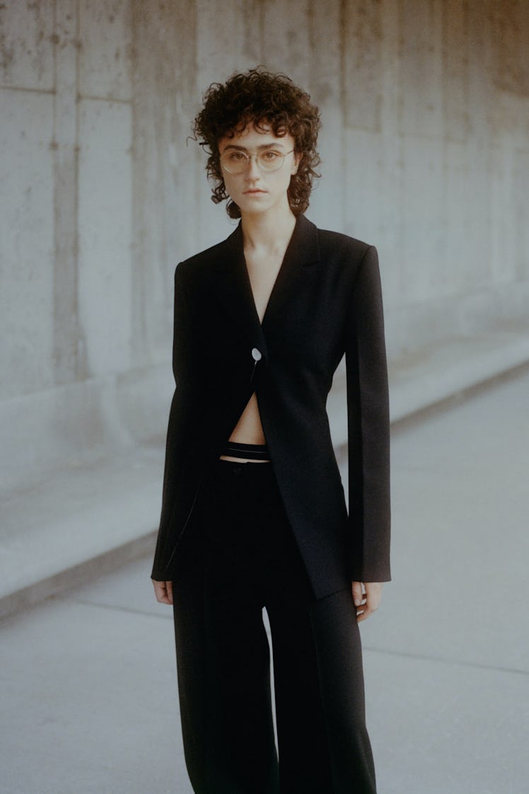 Ella Emhoff at Proenza Schouler in a black suit 