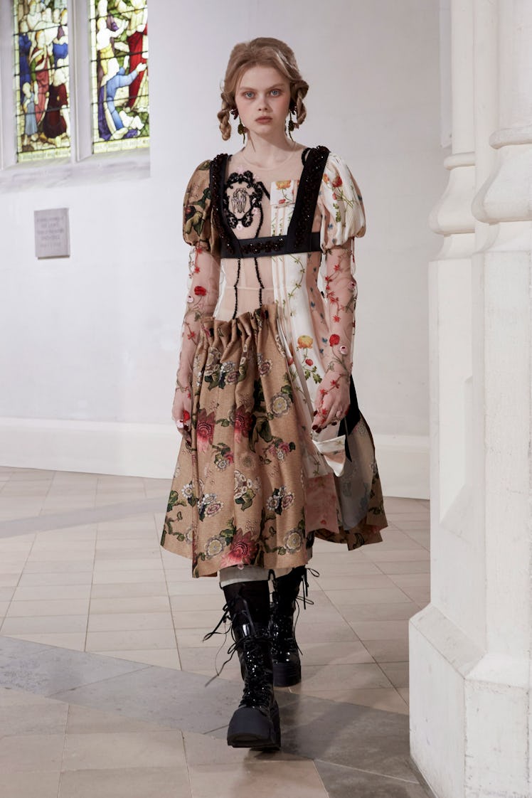 A model in a Simone Rocha black-white floral lace dress  at the London Fashion Week