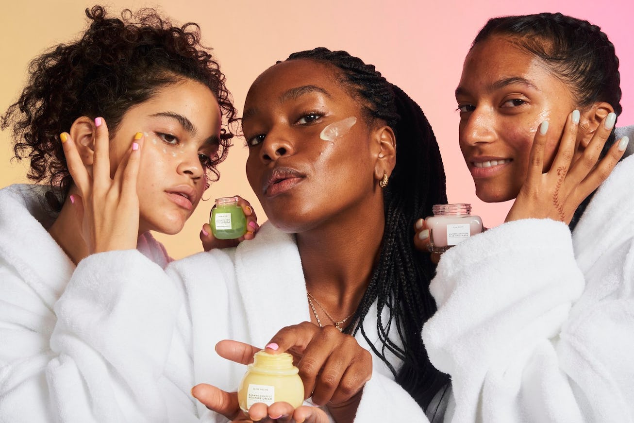 Three people test out Glow Recipe products