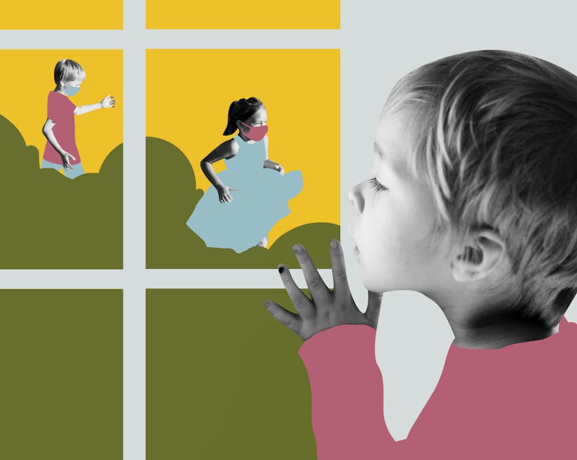 a child peeking out of a window watching other kids play together