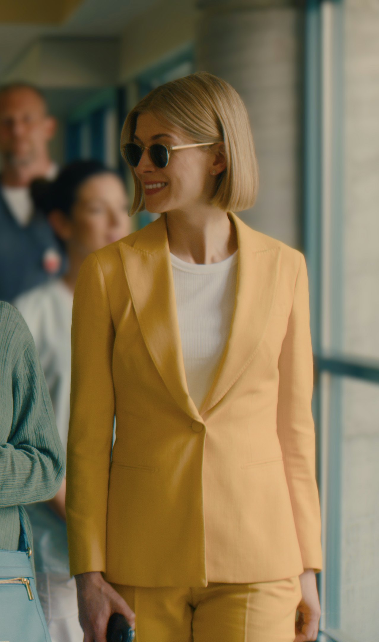 rosamund pike trench coat i care a lot