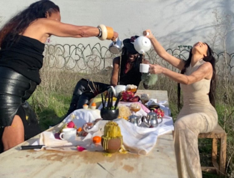 Michèle Lamy and Kim Kardashian together at a tea party table
