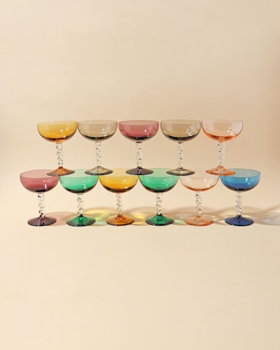 Multi-colored, rounded martini glasses.