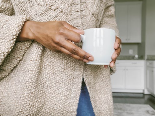 Woman holding a mug