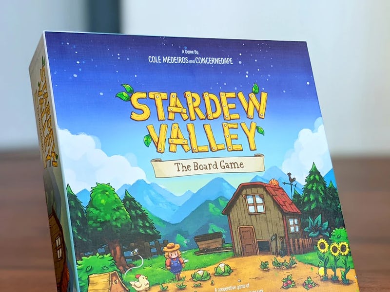 A screenshot of Stardew Valley shows several farmers working on fields by a barn.