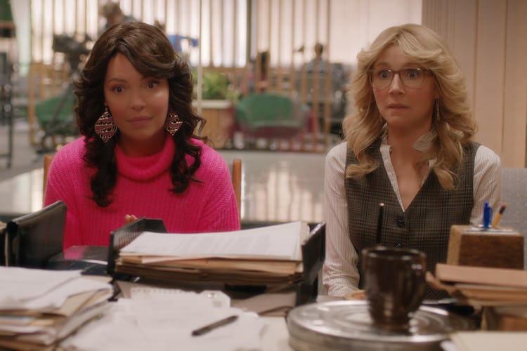(L to R) Katherine Heigl as Tully and Sarah Chalke as Kate, sitting in an office setting with '80s h...