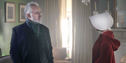 Elisabeth Moss as June and Bradley Whitford as Commander Joseph Lawrence in The Handmaid's Tale