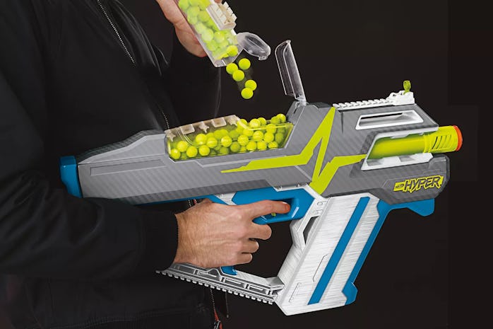 Nerf Hyper blaster being reloaded with projectiles.