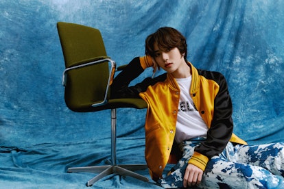 Beomgyu wears Celine by Hedi Slimane clothing, stylist's own earring