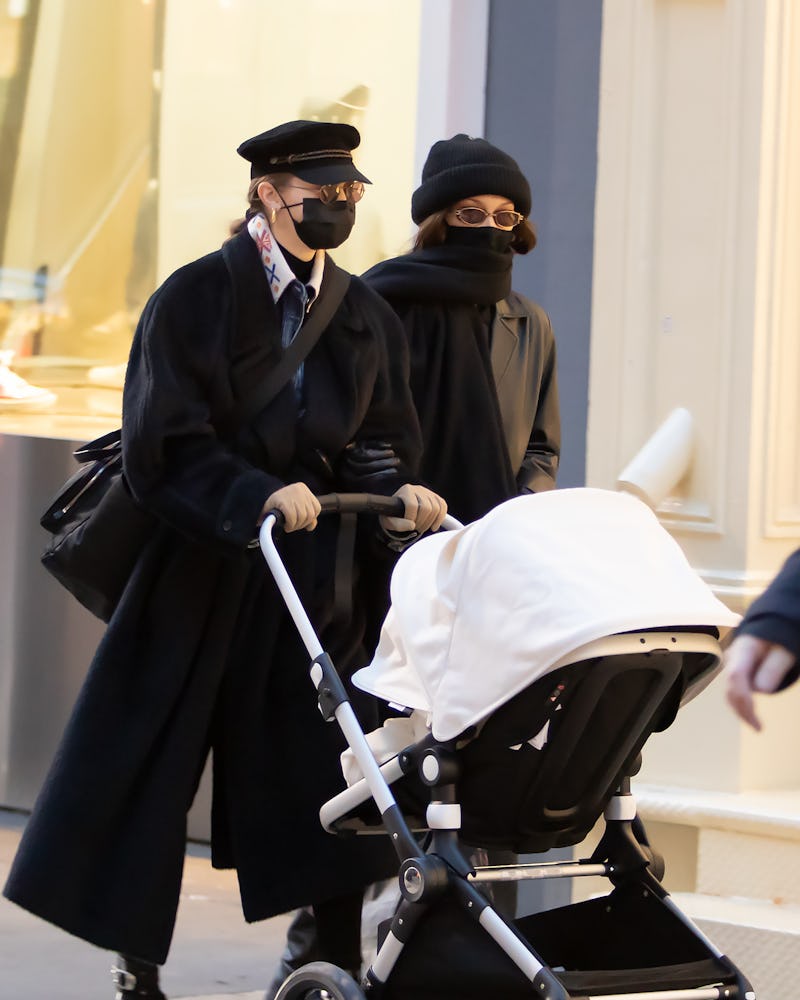 Gigi Hadid goes for a walk with her daughter and Bella Hadid on December 15, 2020 in New York City, ...