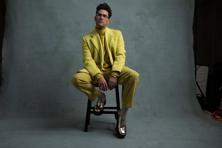 Dan Levy in a yellow Valentino suit