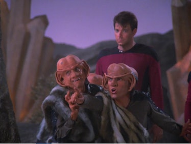 Two Ferengi standing in front of an annoyed First Officer Riker on an episode of Star Trek:  The Nex...