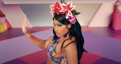 Megan Thee Stallion wears a floral crown in "Cry Baby" video still