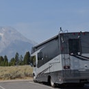 RV parked in front of the mountains