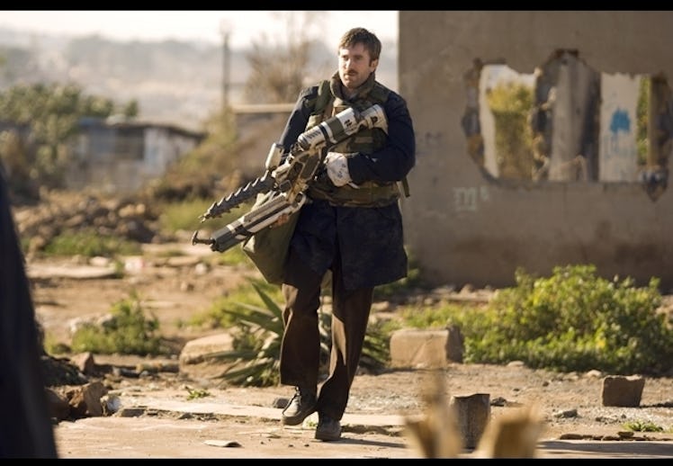 Sharlto Copley looking up in danger during District 9