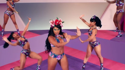Megan thee Stallion dancing in floral set in her "Cry Baby" music video.