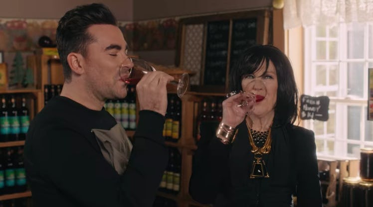 David and Moira Rose drink wine in 'Schitt's Creek.'