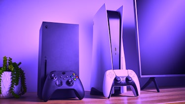 PS5 and Xbox Series X consoles near a TV