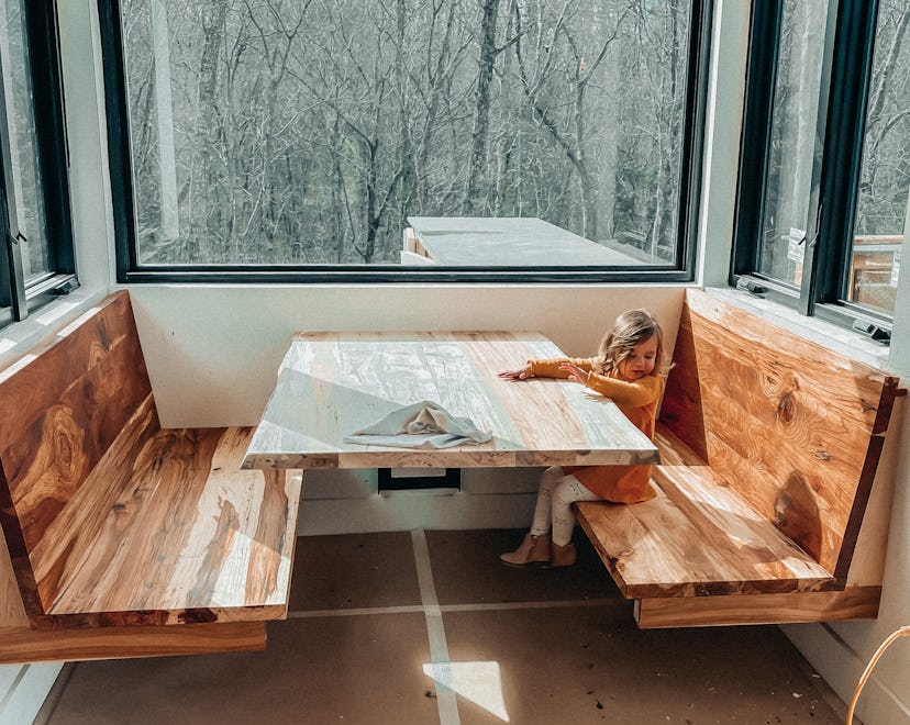 One family decided to build a restaurant booth in their kitchen.