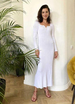 Svitlana Bevza in a white dress.