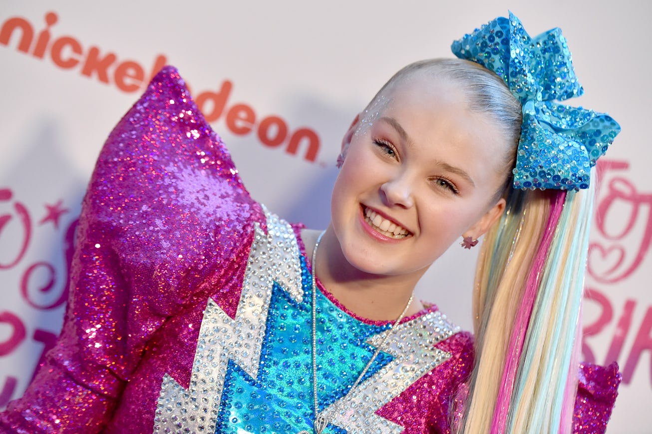 JoJo Siwa said she decided to come out with the encouragement of her girlfriend.