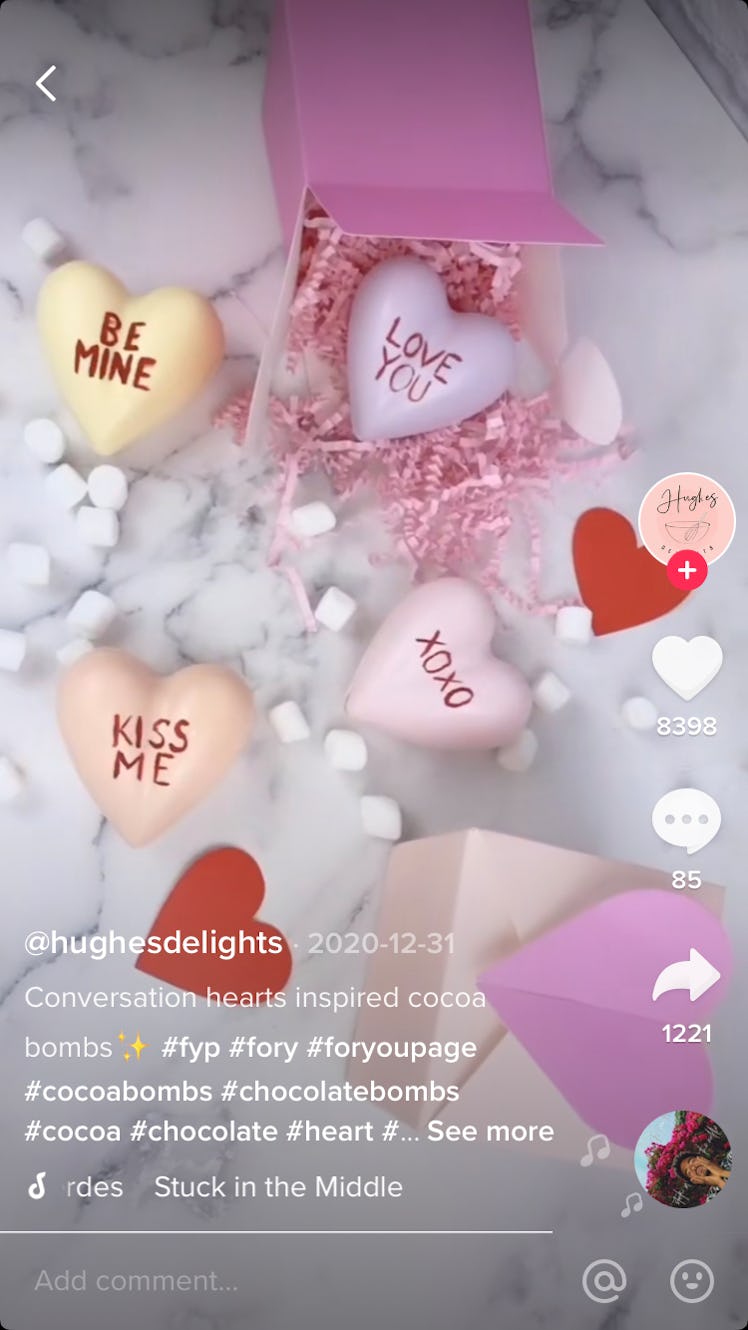 TikToker @hughesdelights makes Valentine's Day DIY hot cocoa bombs inspired by conversation heart ca...