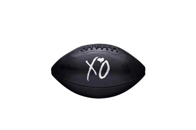 Black football with XO in the middle