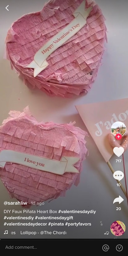 A TikTok user creates a heart-shaped piñata for a DIY Valentine's Day gift.