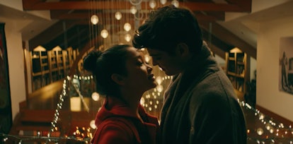 Lara Jean and Peter K go in for a kiss while at a hotel in 'To All the Boys I've Loved Before.'