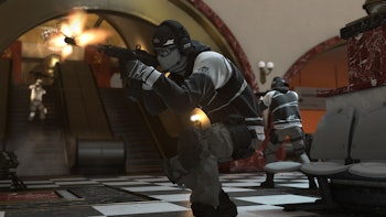 A character in League Play in Call of Duty: Cold War crouching on the floor with a gun 
