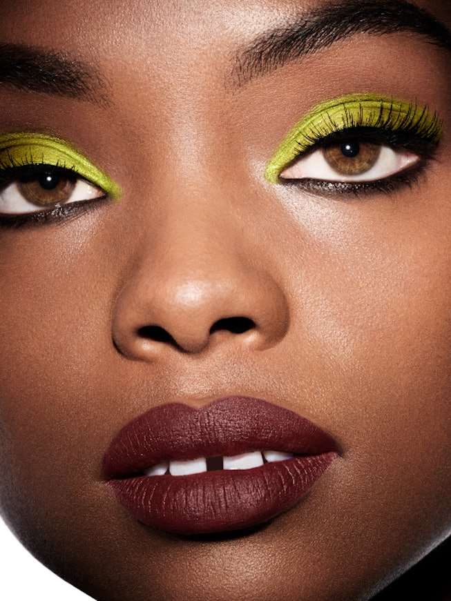 Model wears green eyeshadow, one of summer 2021's biggest makeup trends