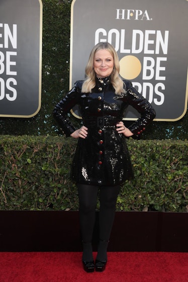 Amy Poehler in a black Moschino coat-dress at the Golden Globes 2021