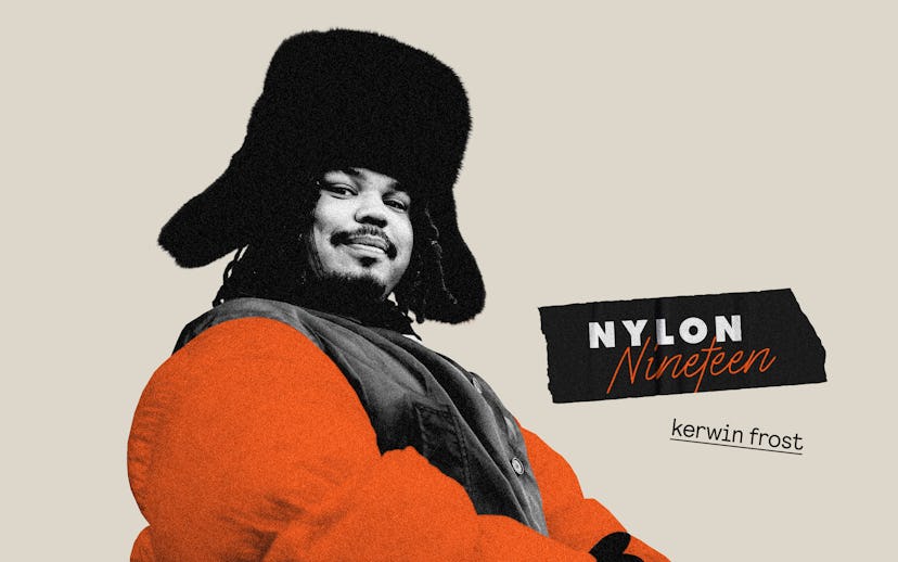 Kerwin Frost in an orange puffer jacket and black winter ear-flaps hat