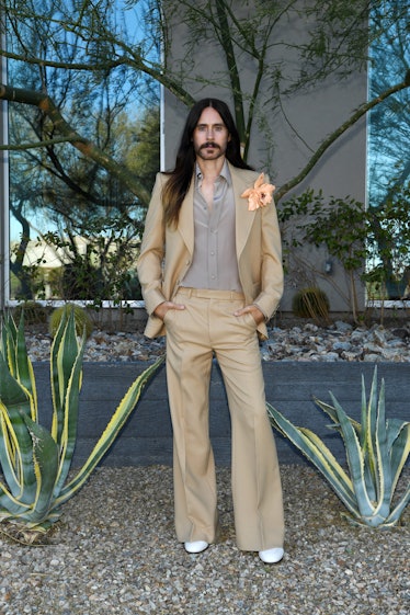 Jared Leto in a beige Gucci suit and a grey shirt at the Golden Globes 2021