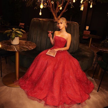 Maria Bakalova in a red Giorgio Armani dress at the 78th Golden Globe Awards