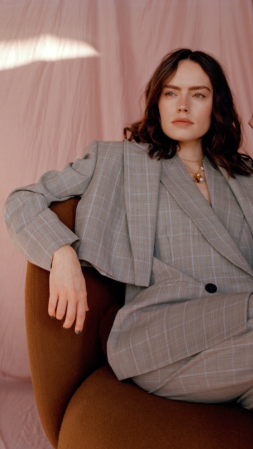 Daisy Ridley wearing a gray Alexander McQueen suit