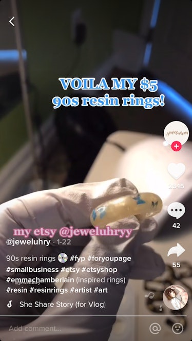 @jeweluhry DIYs a resin ring with blue butterflies on TikTok.