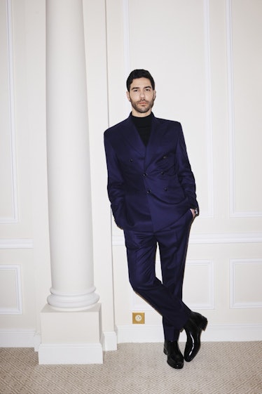 Tahar Rahim in a navy Louis Vuitton suit at the Golden Globes 2021
