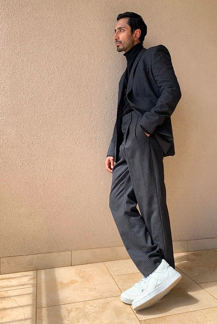 Riz Ahmed in a grey suit by Celine Homme