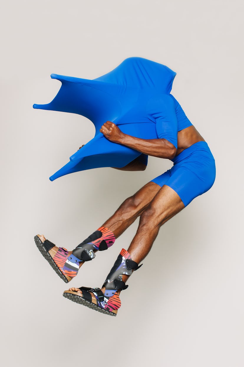 Central Saint Martins Designers Helping Birkenstock Get Weird in a photoshoot with a model jumping i...