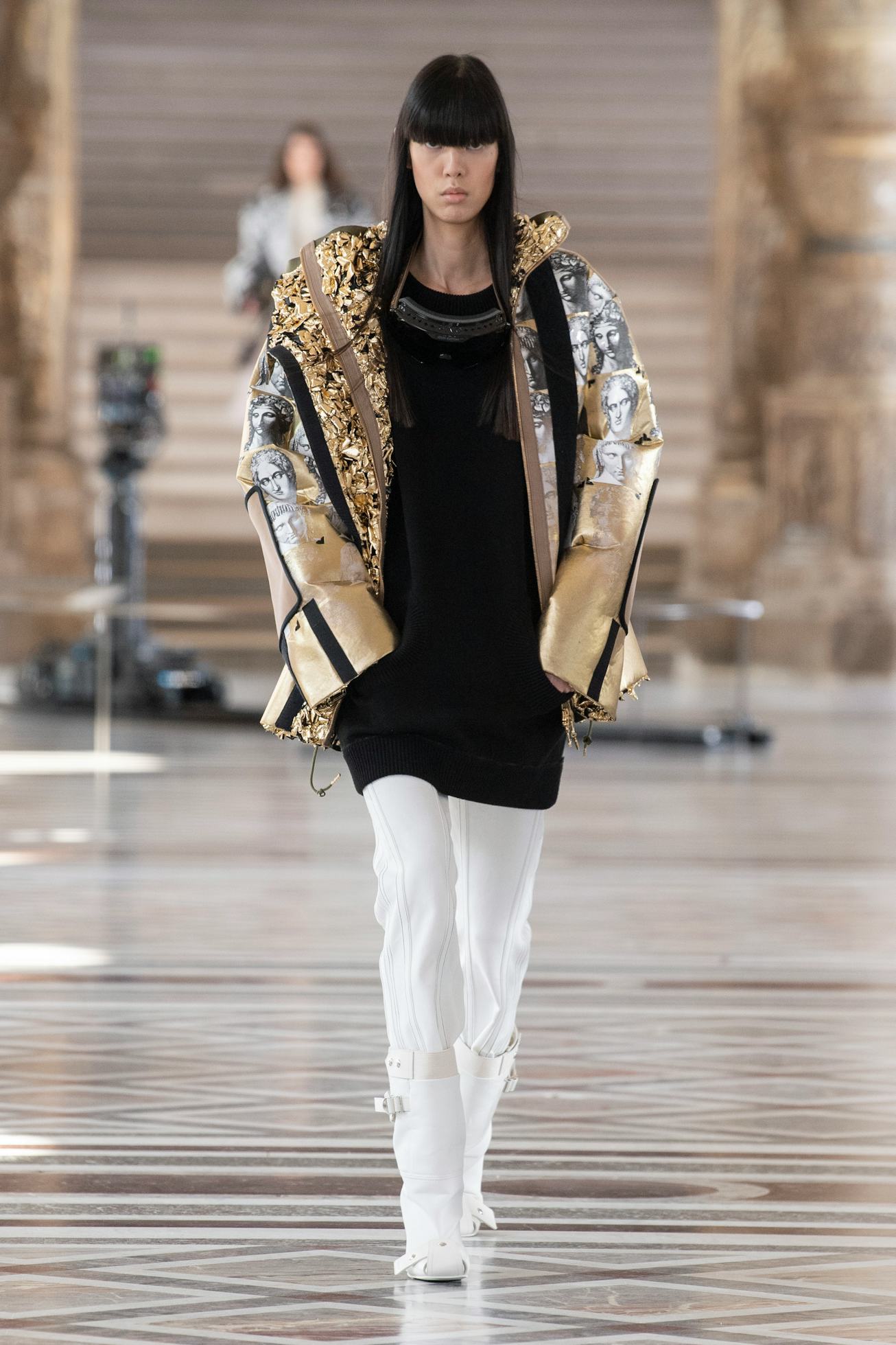 Model walks in Louis Vuitton Fall Winter 2021 presentation 