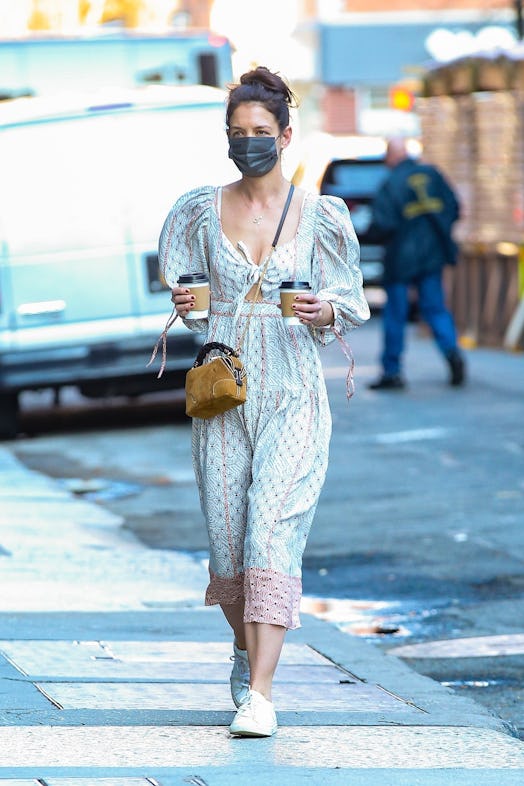 Katie Holmes steps out for coffee rocking a Bohemian chic dress for the occasion. The street style i...