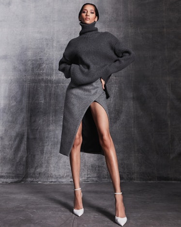 model in gray skirt and sweater