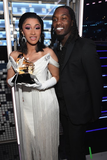 Cardi B in white gown at Grammys.