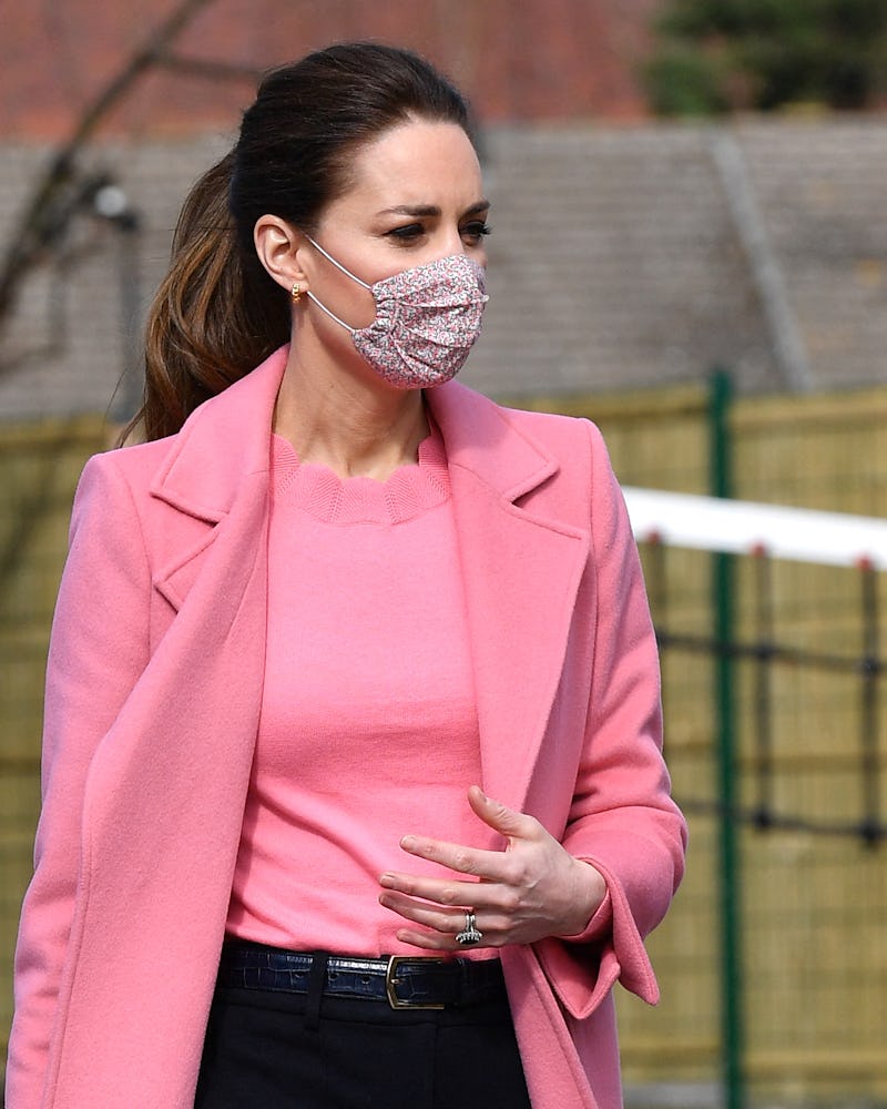 Britain's Catherine, Duchess of Cambridge gestures during a visit to School21 following its re-openi...