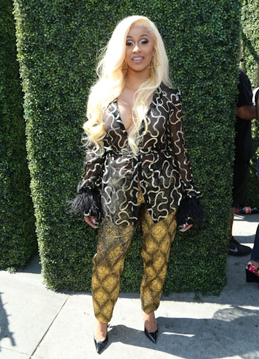 Cardi B in mismatched, funky patterned separates. 