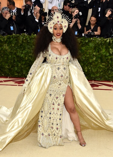 Cardi B in a dress that is giving holy saint vibes.