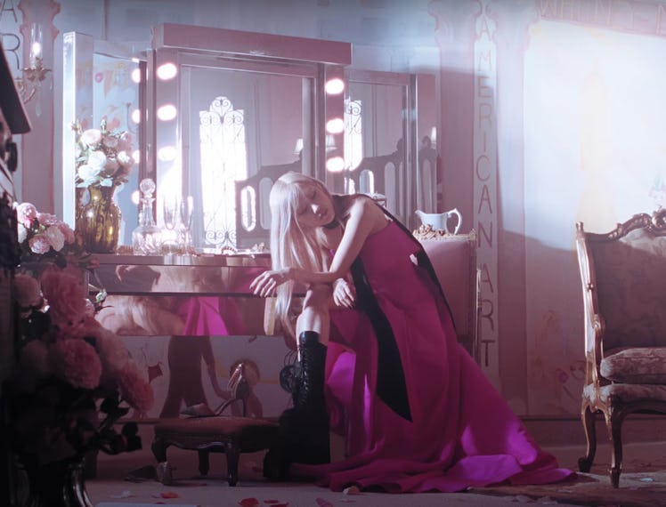 Rosé in a pink gown.