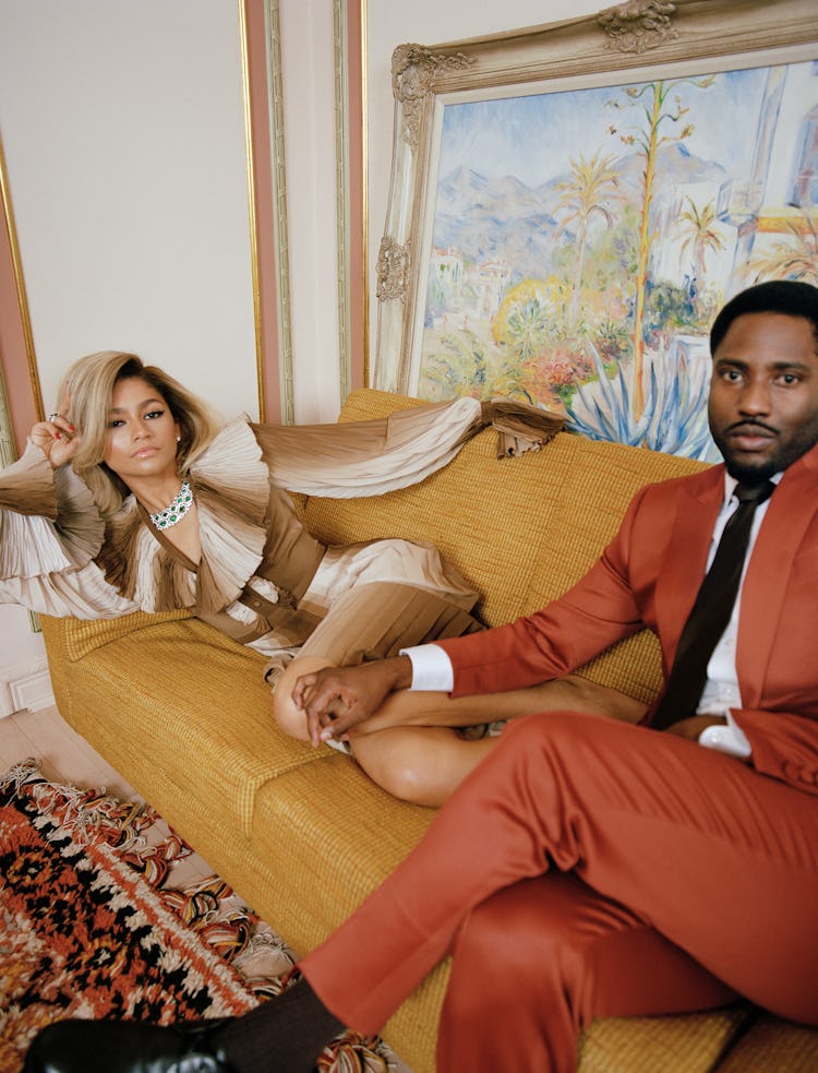 Zendaya wearing a Gucci dress and John David Washington wearing a Frère suit, shirt, and tie