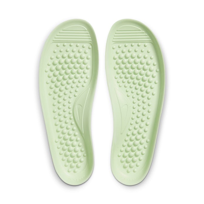 Massage nubs on green insole of Nike Offline shoe